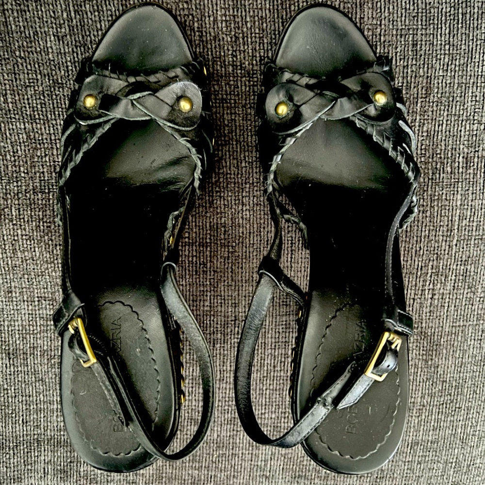 Black, leather pumps. Like new, worn only a couple of times.